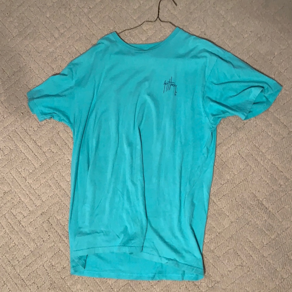 Blue guy Harvey shirt